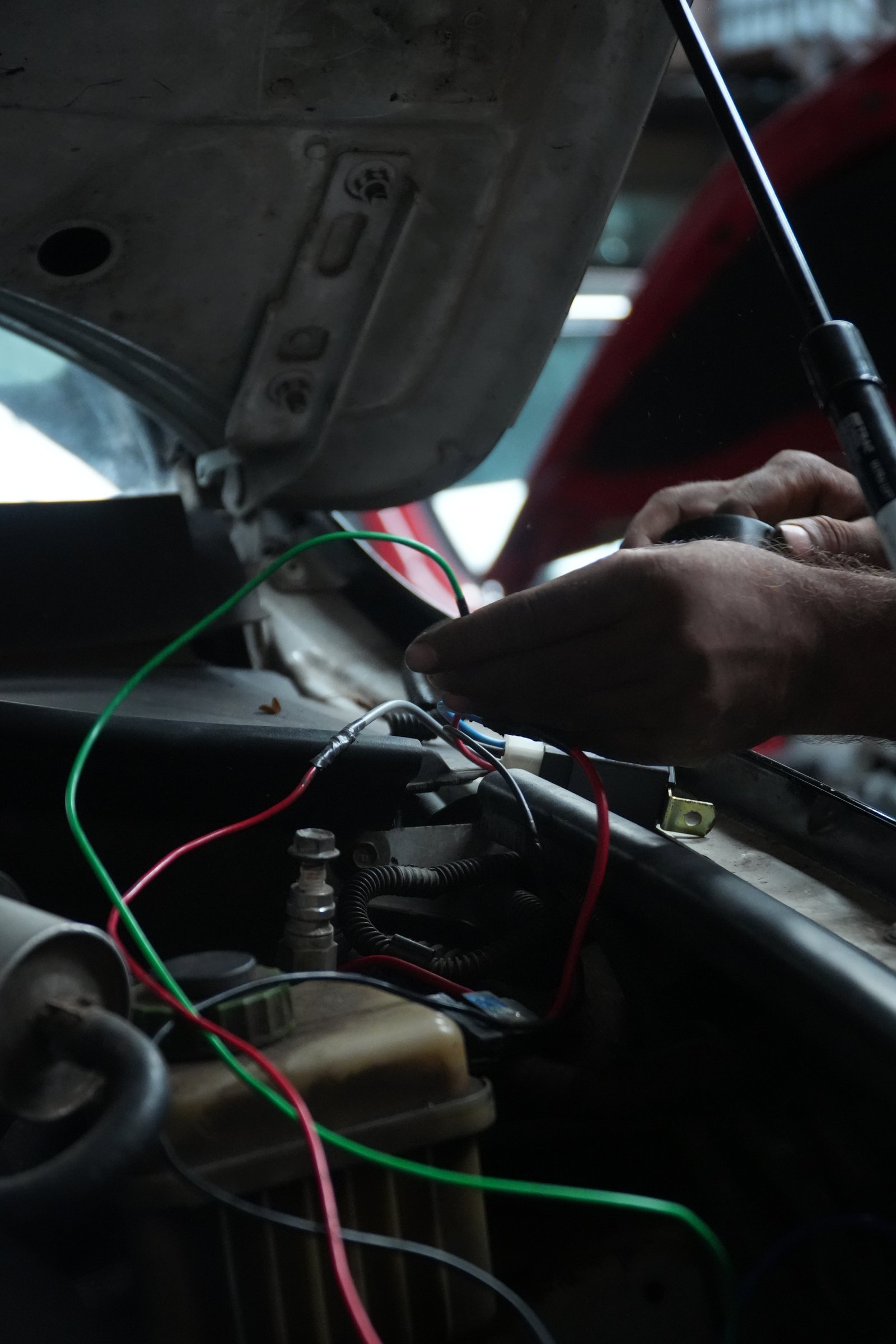 Mechanic assembling a valvetrain component