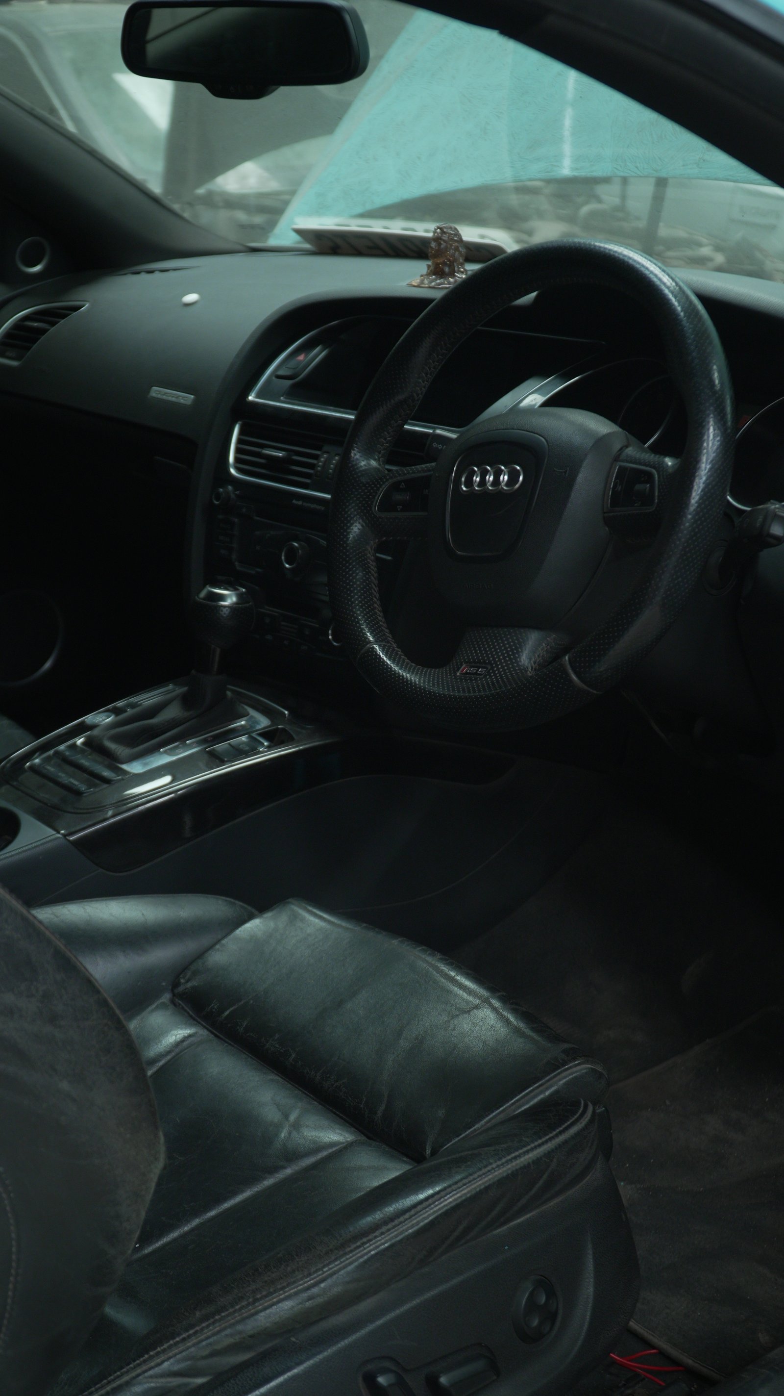 Bespoke car interior with Alcantara and carbon fiber trim